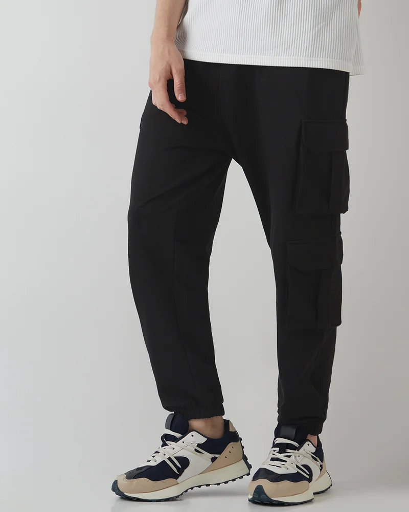 Bewakoof  Men's Black Super Loose Fit Cargo Warm Joggers for Men | Best Price UAE